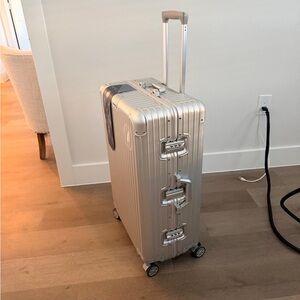 Silver Rolling Suitcase aluminum